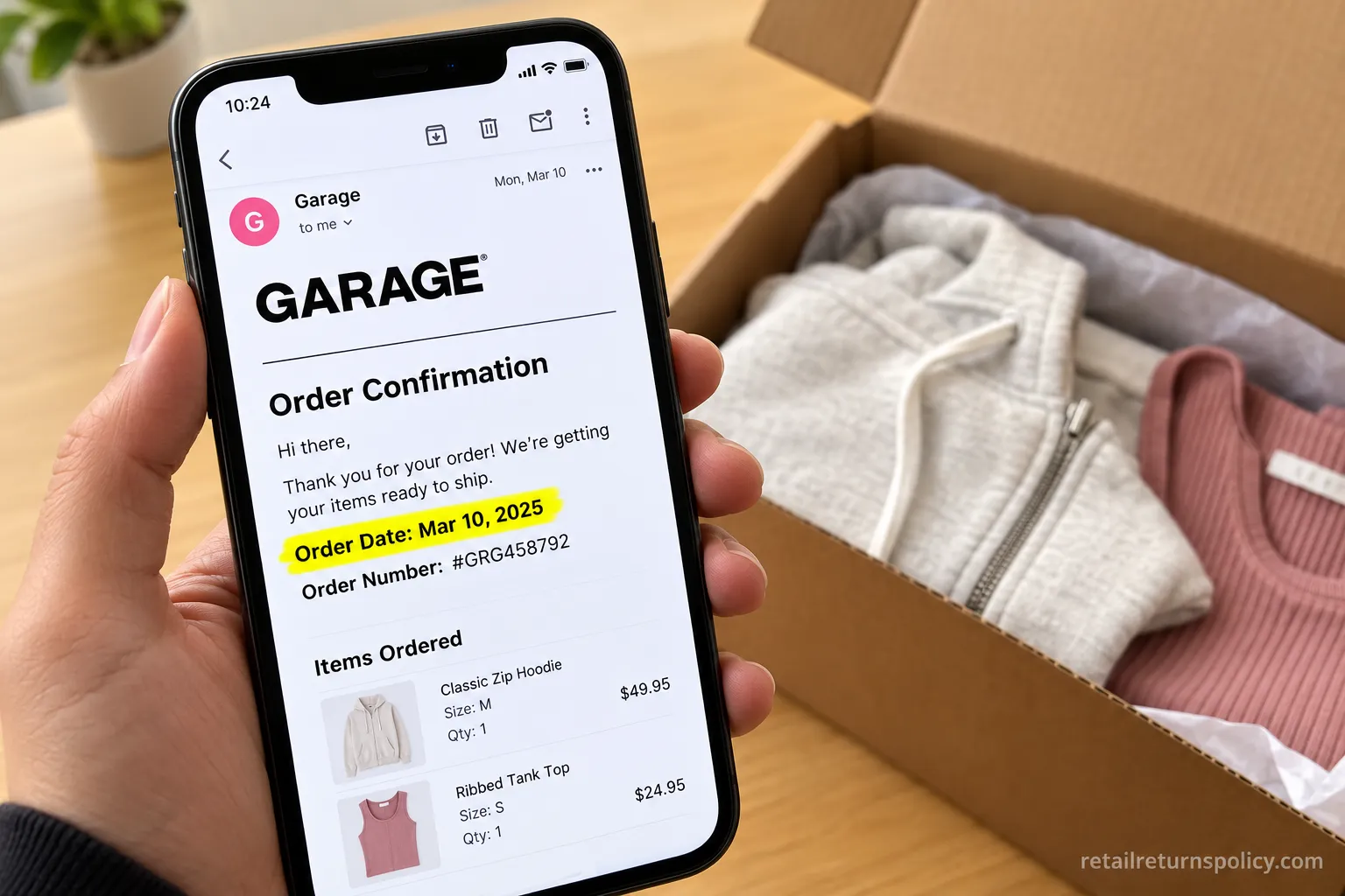 Alt Text: Phone showing a Garage order confirmation email with the order date that starts the 30-day return window.
