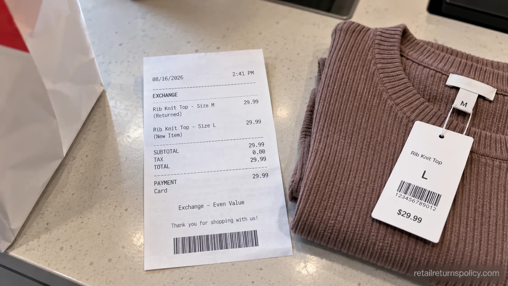 H&M in-store even exchange receipt next to the replacement garment tag, 2026.