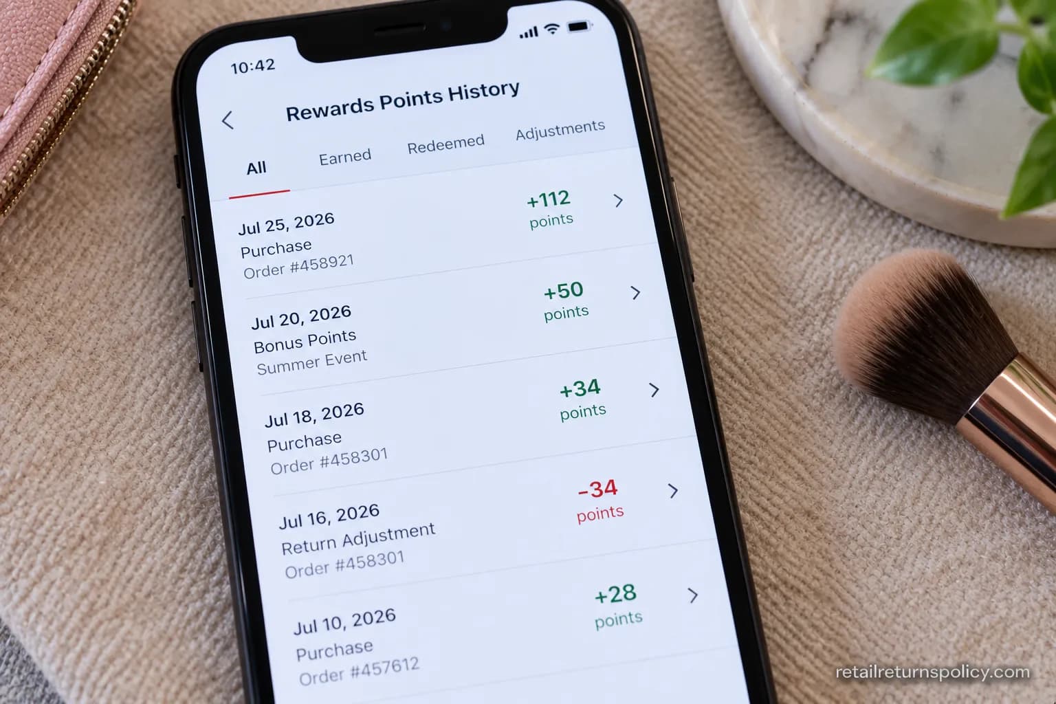 Rewards points history showing a 34-point reversal after an Ulta return