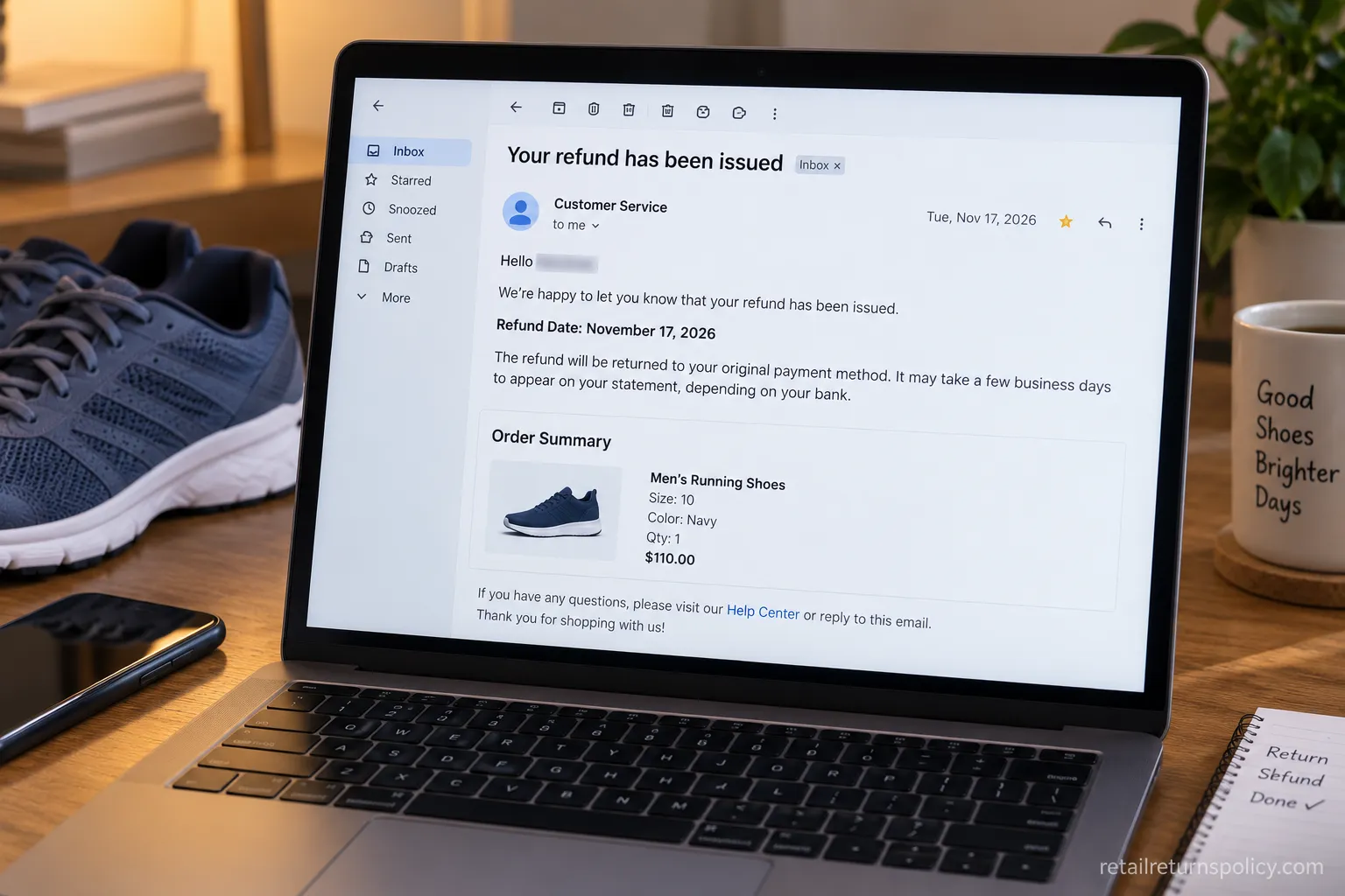 Zappos refund confirmation email showing the refund date on a laptop.