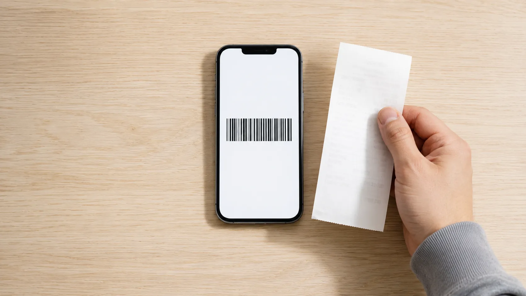 Representative illustration of a smartphone displaying a generic return barcode beside a printed receipt slip, depicting an app barcode return without a paper receipt or packing slip.