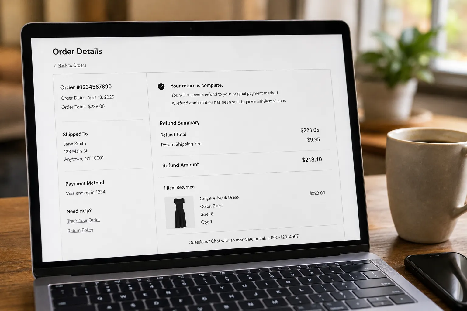 Saks refund confirmation screen showing the $9.95 return shipping fee deducted from the refund